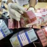 Rupiah Diprediksi Melemah ke Rp17.300, BI Diperkirakan Tahan Suku Bunga 4,75% pada RDG April 2026